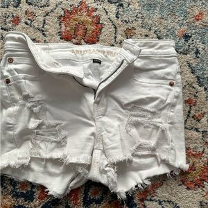 White ripped American Eagle shorts